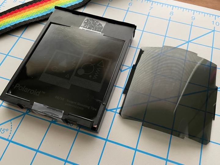 ND filter taped onto a Polaroid 600 film cartridge