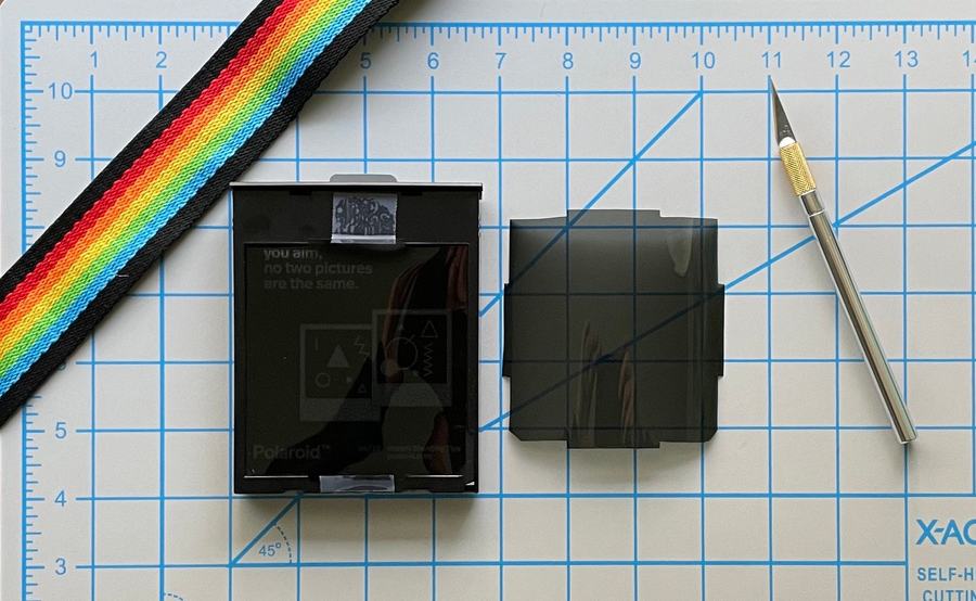 Twin Tails ND filter beside a Polaroid 600 film cartridge